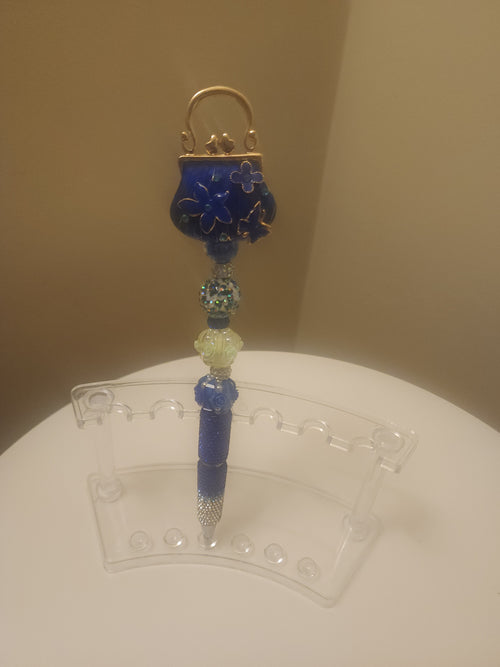 Blue and gold purse pen