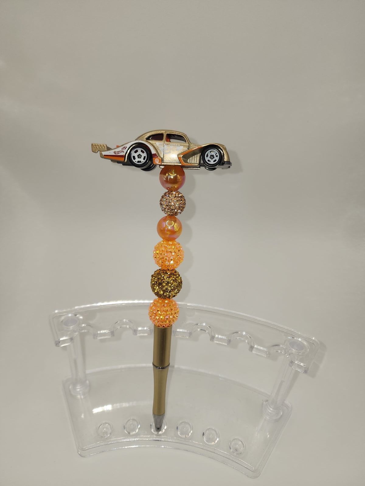 Sports race car gold pen